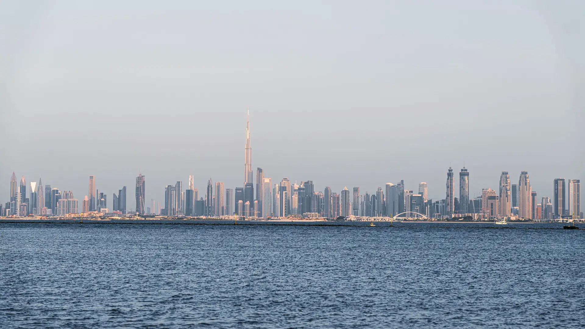 A stunning view of Dubai's skyline featuring Burj Khalifa across the sea
