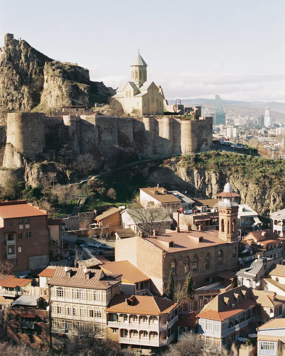 Aerial view of the historic Narikala Fortress overlooking Tbilisi's Old Town with its blend of ancient and modern architecture