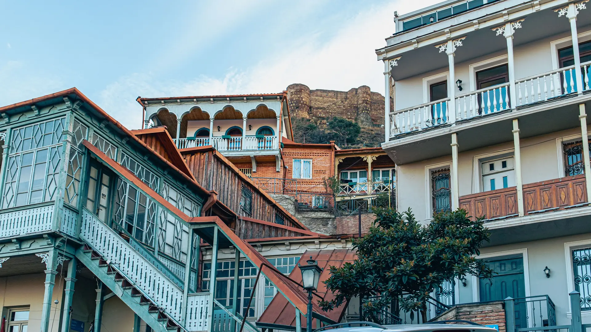 Traditional Tbilisi houses with ornate balconies showcasing classic Georgian architecture