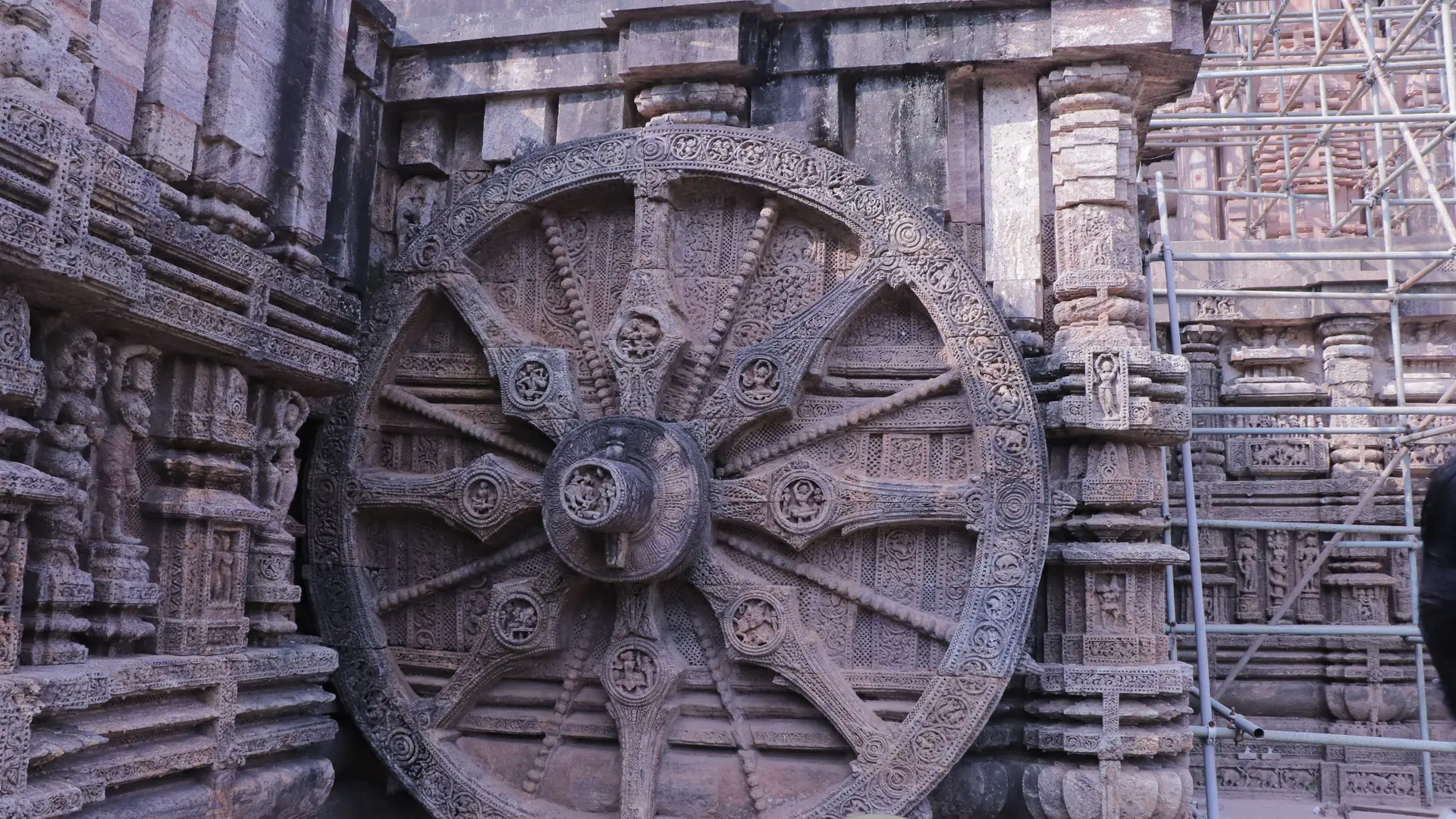Ancient stone carved wheel at Konark Sun Temple in Odisha, India