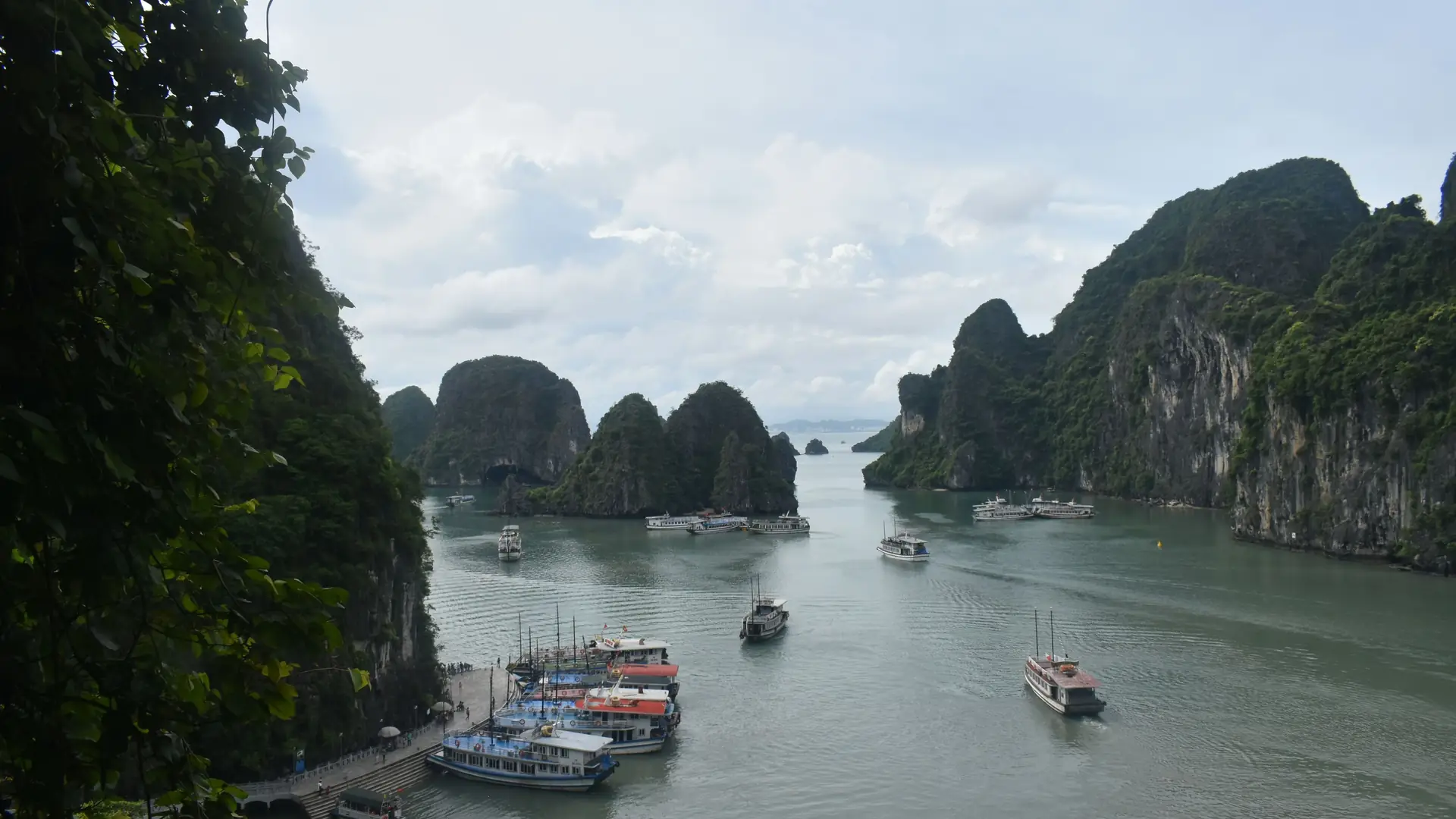 Explore the stunning limestone islands and boats in Ha Long Bay, Vietnam